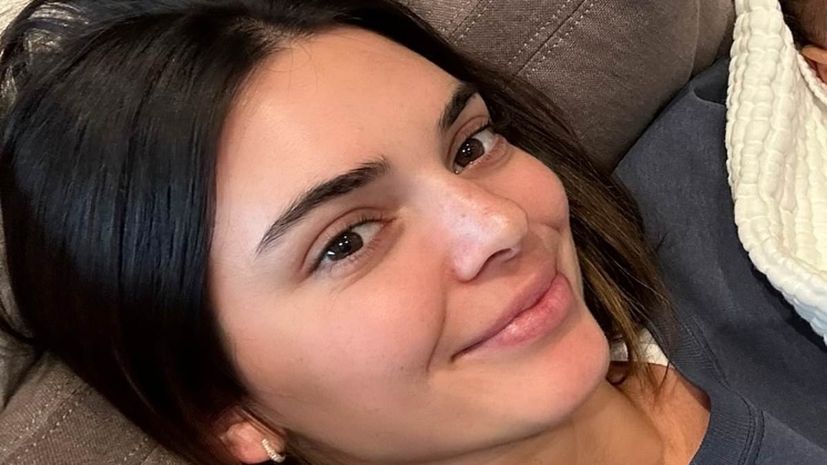 Aunt duties! Kendall Jenner sips red wine while feeding Kylie's son Aire