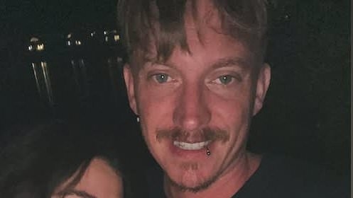 John Farnham's son James flaunts his pregnant partner's baby bump as they prepare to welcome their first child together