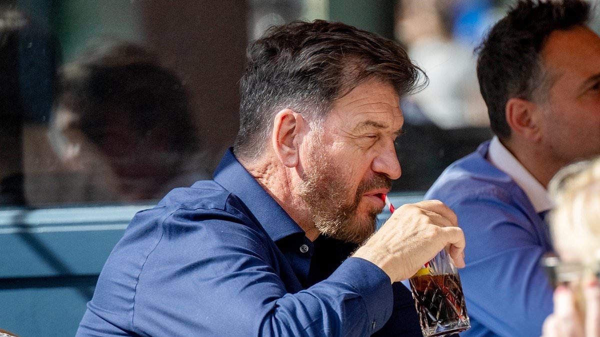 Nick Knowles, 62, looks downcast as he joins his stylish fiancée Katie Dadzie, 34, for lunch date in the sun