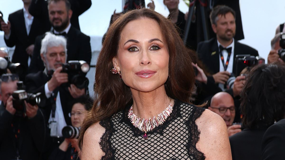 Minnie Driver oozes glamour in a black lace and fringed gown for the premiere of The History Of Sound at Cannes Film Festival