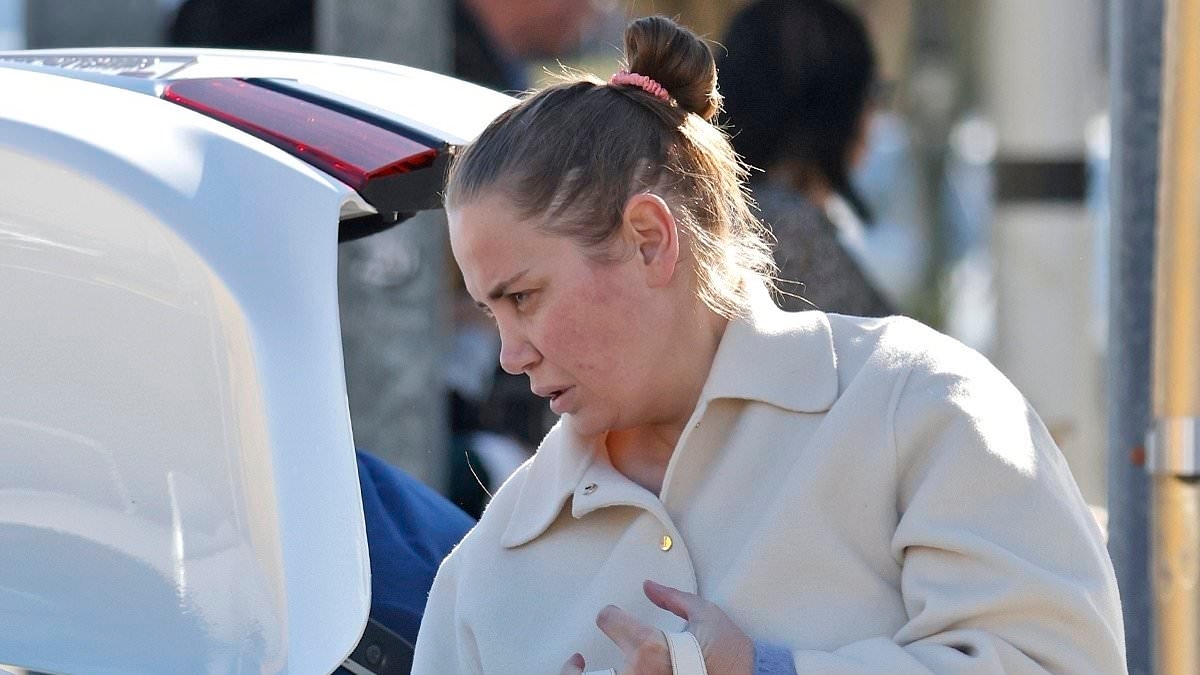 Jelena Dokic is seen for the first time since announcing the death of her abusive father as she jets into Brisbane