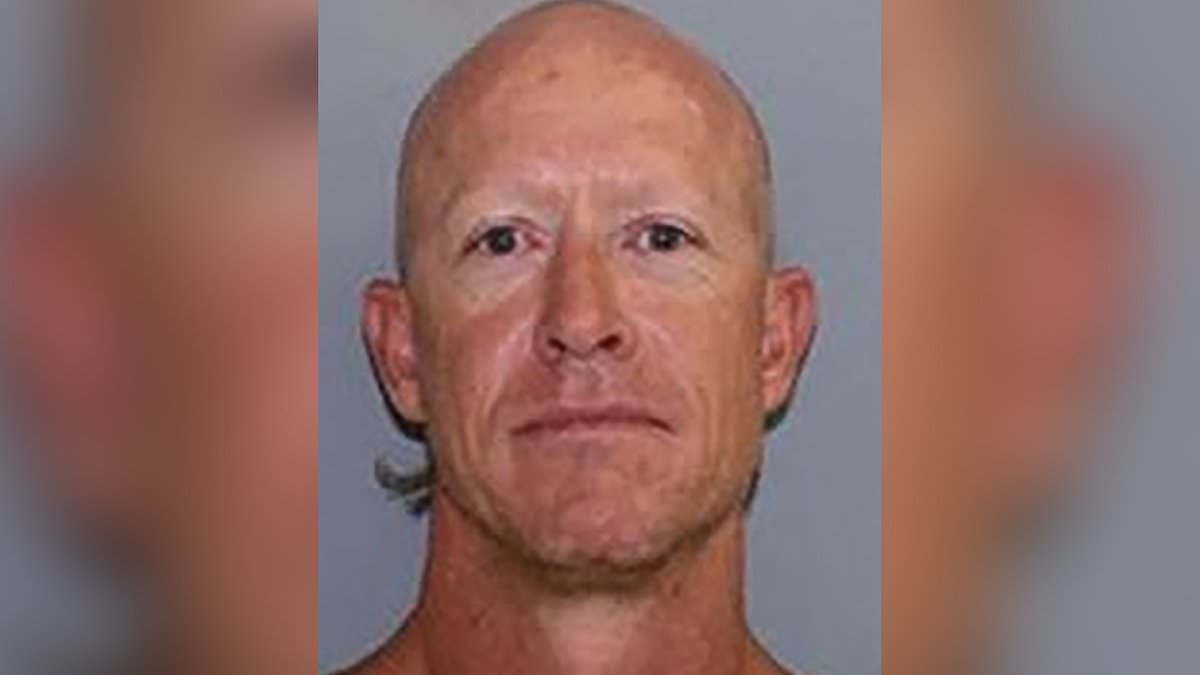 Urgent manhunt for heavily tattooed prison inmate who escaped on a tractor two days ago