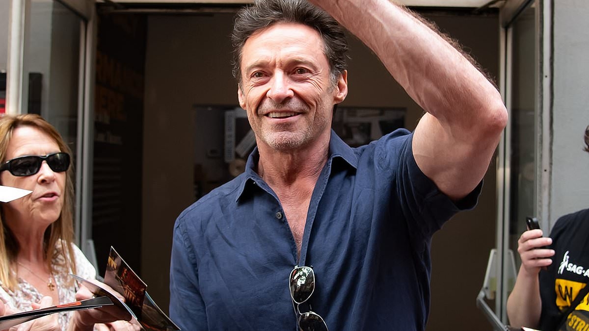 Hugh Jackman is in high spirits as he's mobbed by fans in New York despite reports ex Deborra-Lee Furness is 'planning to release divorce tell-all'