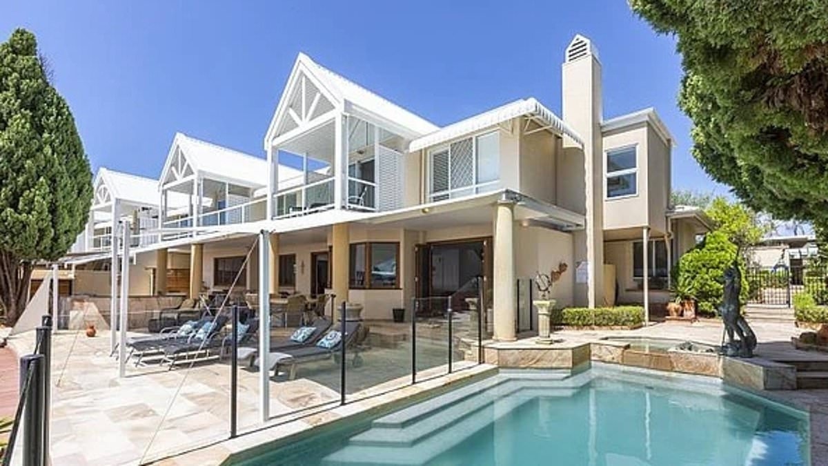 Millionaires' war escalates after homeowner complains about size of his neighbours' boat