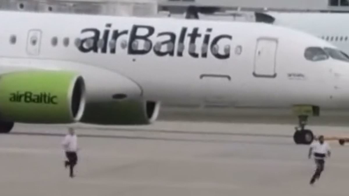 Moment man sprints across taxiway near where planes land at Heathrow Airport