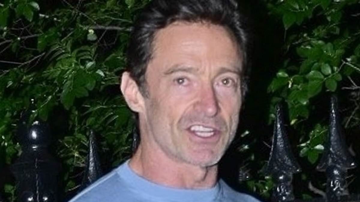 Hugh Jackman signs autographs and poses for selfies with fans as he departs the Minneta Lane Theatre in New York