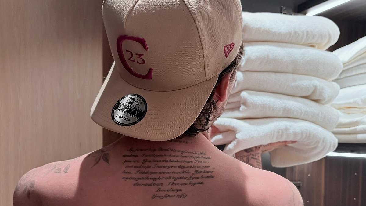 Brooklyn Beckham shows off love letter tattoo tribute for his wife Nicola Peltz as she claims they can 'get through it together' during family feud