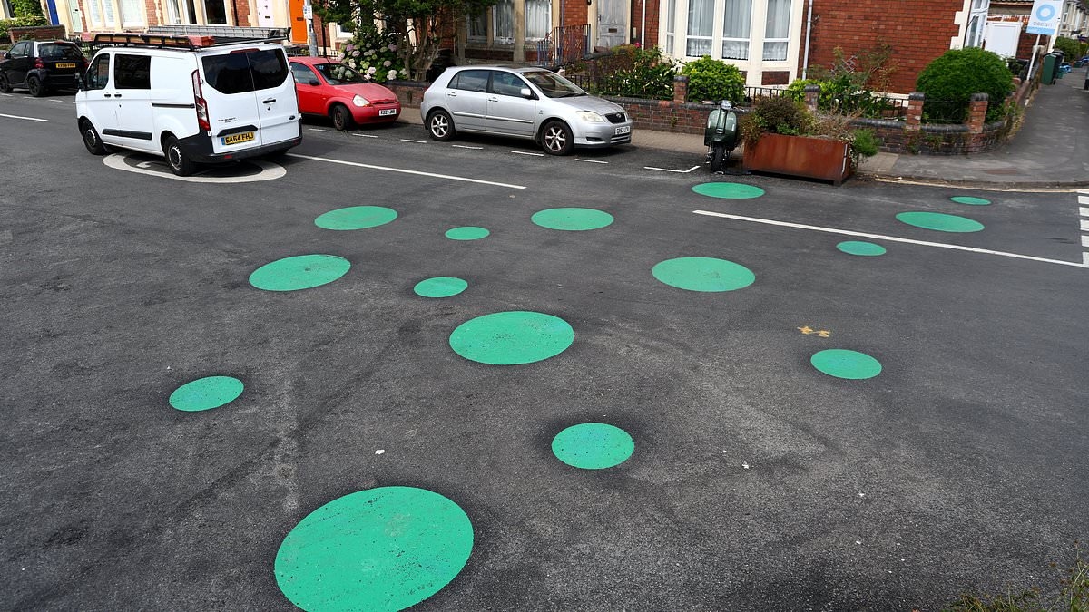 Locals baffled as mystery green spots appear on street overnight - but what are they for?