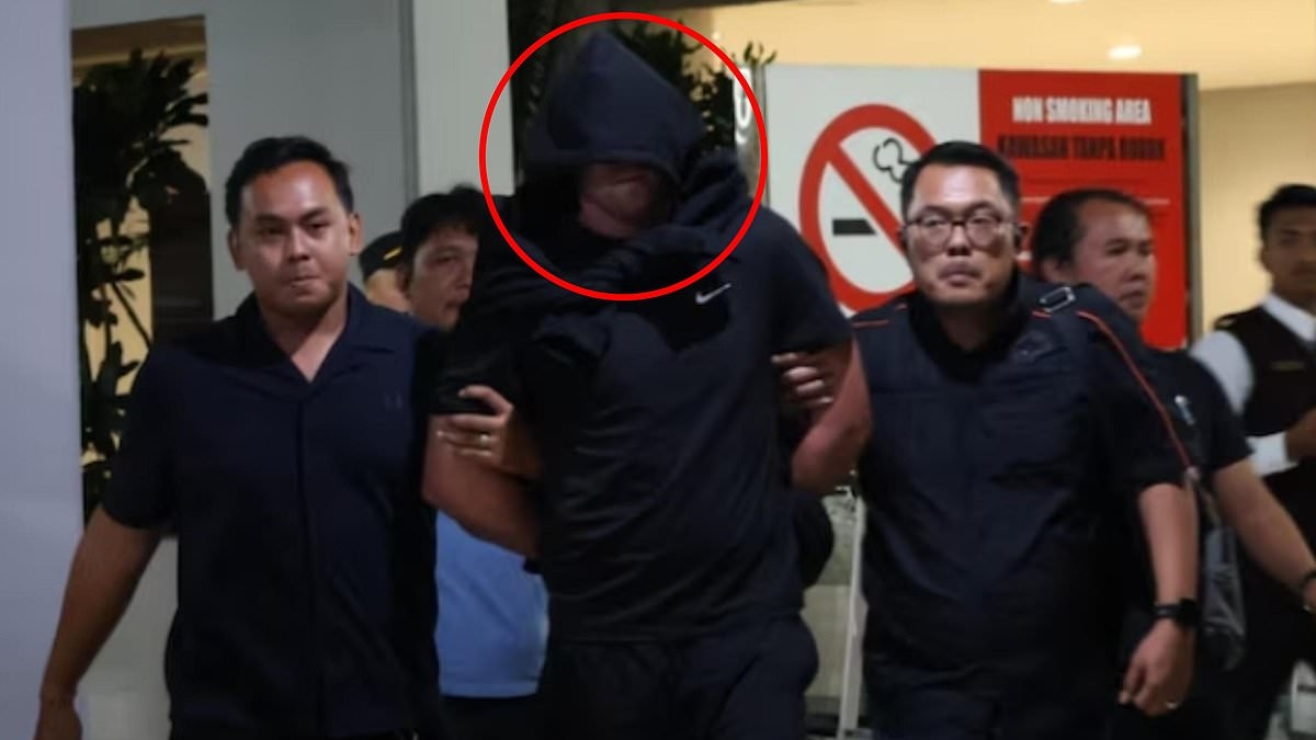 Bali shooter suspect returns to island in handcuffs after gangland hit of two Aussies in luxury villa