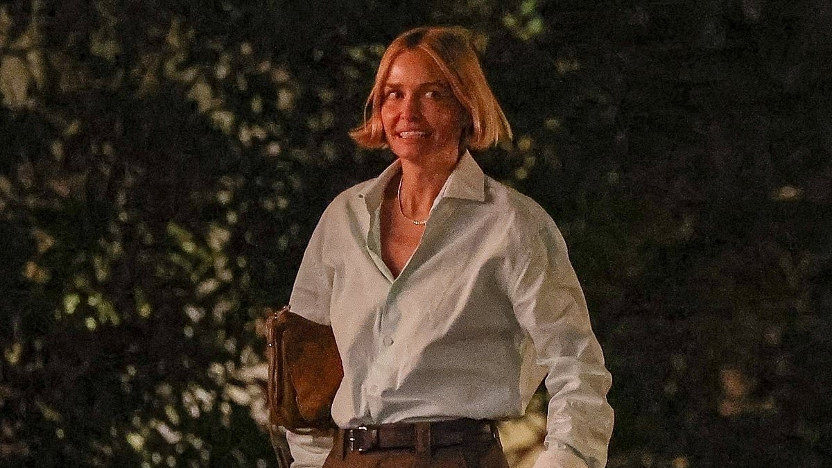 Lara Worthington cuts a chic figure in men's shirt and retro trousers as she parties at infamous LA hot spot Chateau Marmont