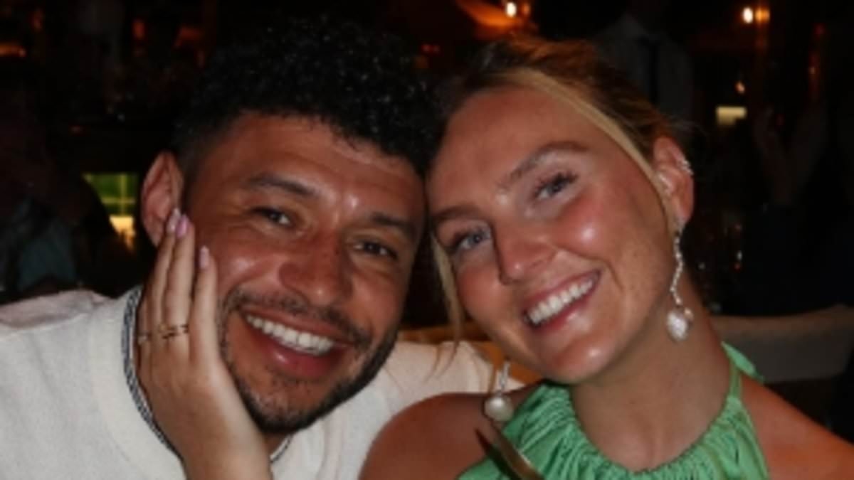 Perrie Edwards puts on a rare loved-up display with footballer fiancé Alex Oxlade-Chamberlain as they enjoy a romantic getaway abroad