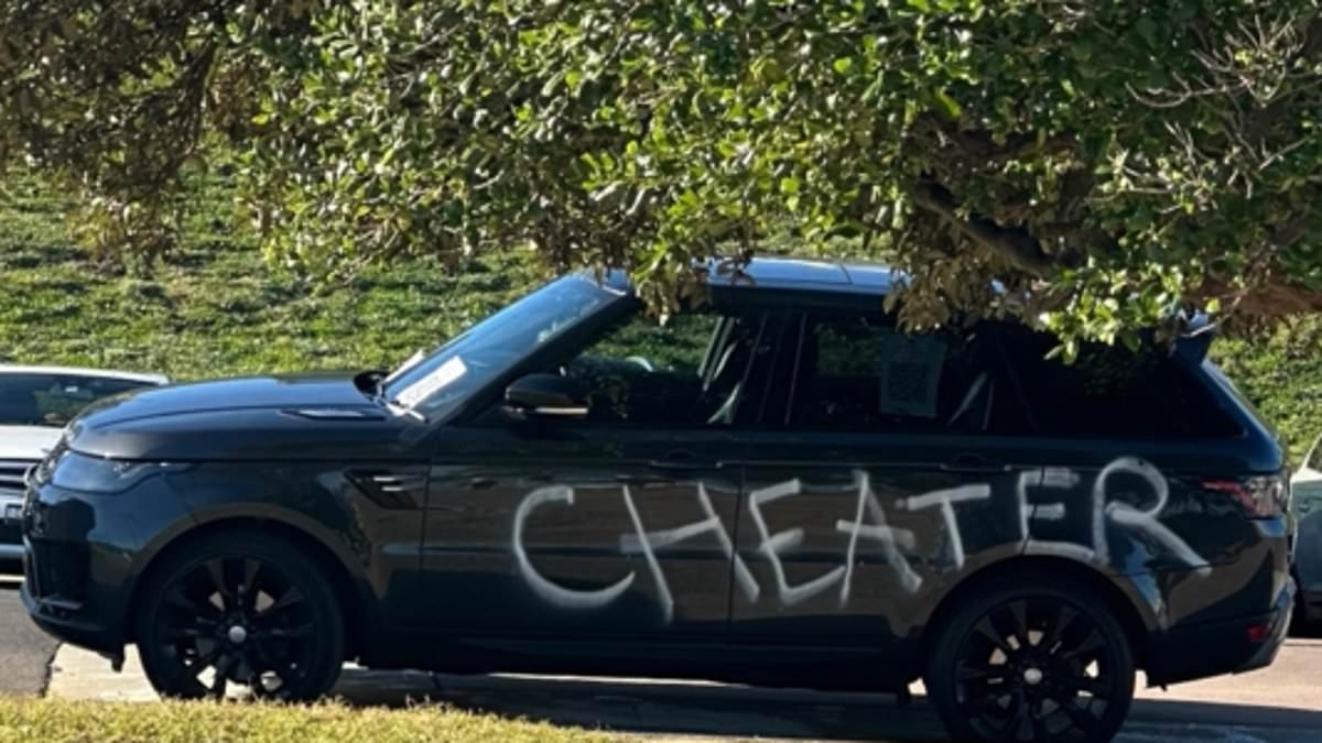Sydney's Eastern Suburbs rocked by cheating scandal as mystery Range Rover is spray-painted with brutal message