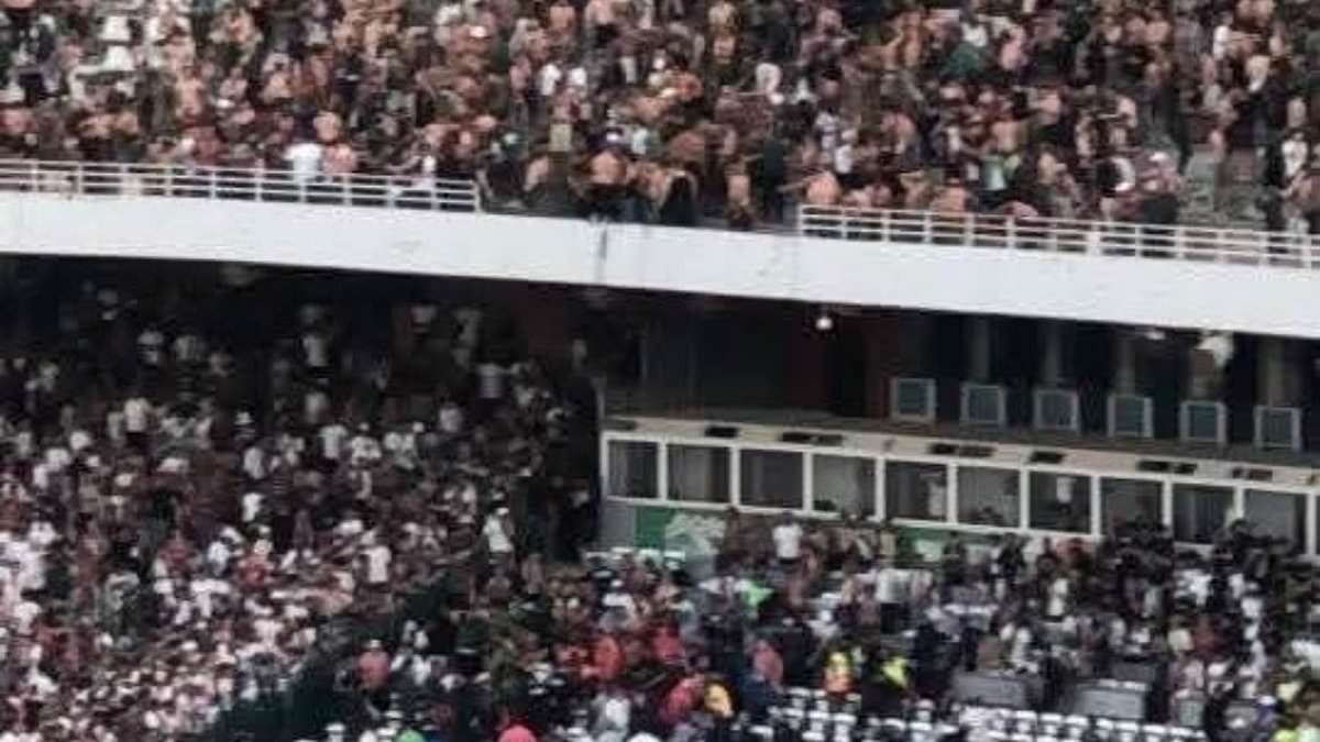 Three football fans dead and 70 injured in horror of Algeria stadium disaster - as supporters fall from stand after barrier breaks amid title celebrations