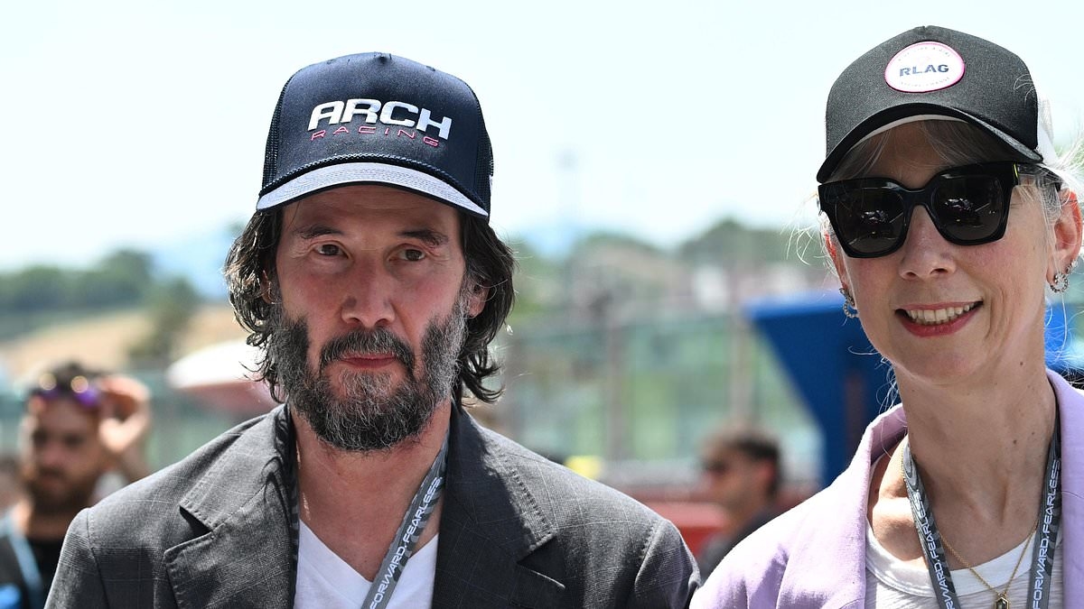 Keanu Reeves and his partner Alexandra Grant spend time at MotoGP in Italy amid claims they secretly wed