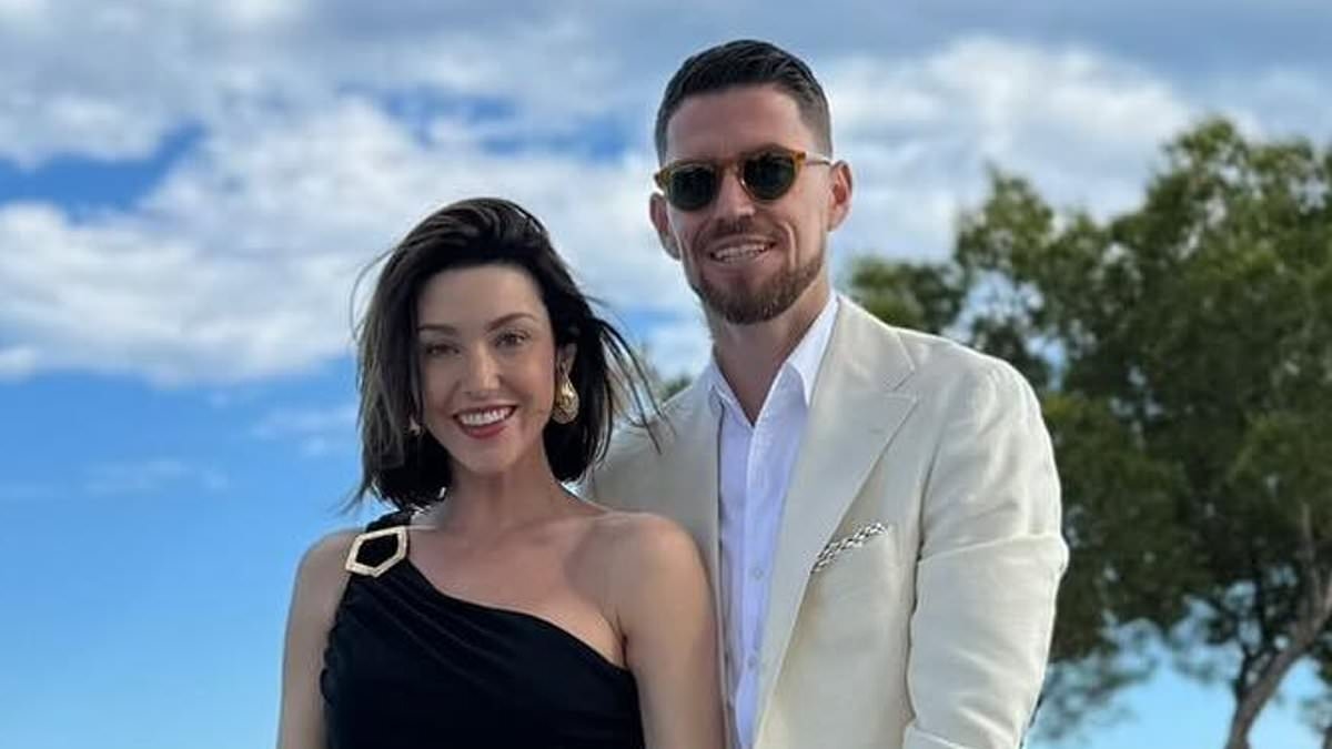 Jude Law's ex Cat Harding's wedding to footballer Jorginho forced to move location due to rain - as former Arsenal star details bursting into tears amid their emotional Lake Como ceremony