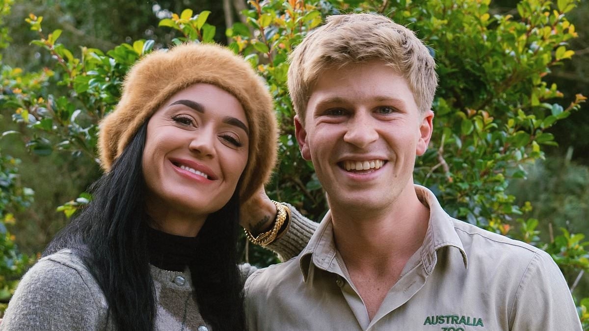 Awkward moment Robert Irwin DROPS Katy Perry on the ground after the pop star asked him for a dance