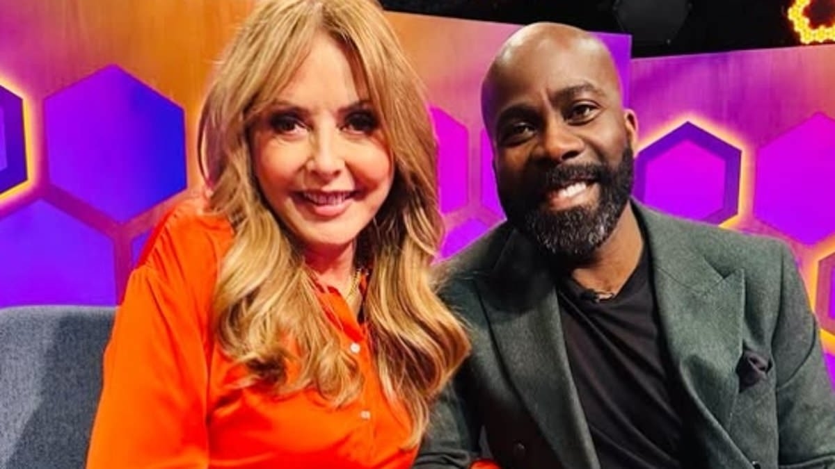 Carol Vorderman, 65, shows off her VERY smooth visage as she cosies up to Melvin Odoom, 44, for the first time since he admitted she's his showbiz crush in the I'm A Celeb jungle