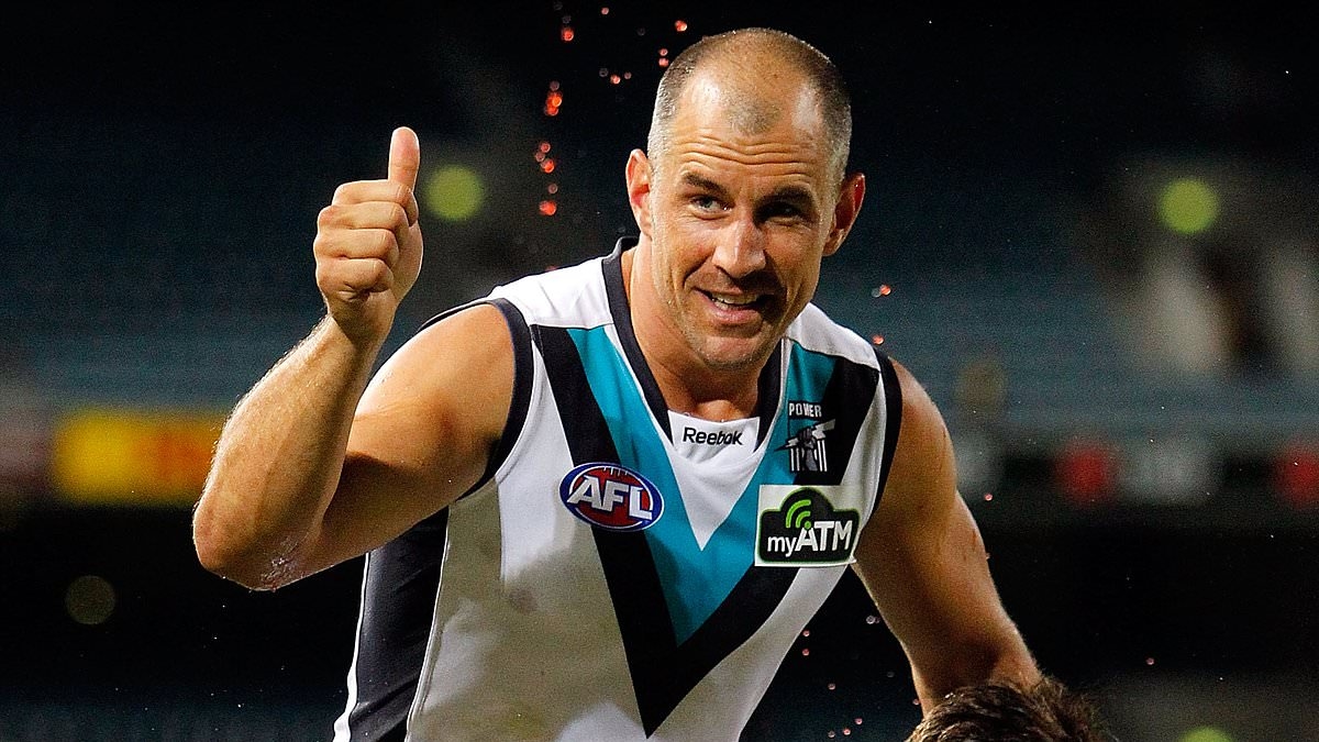 Footy legend turned high-flying board member under review for allegedly promoting conspiracy theories on social media