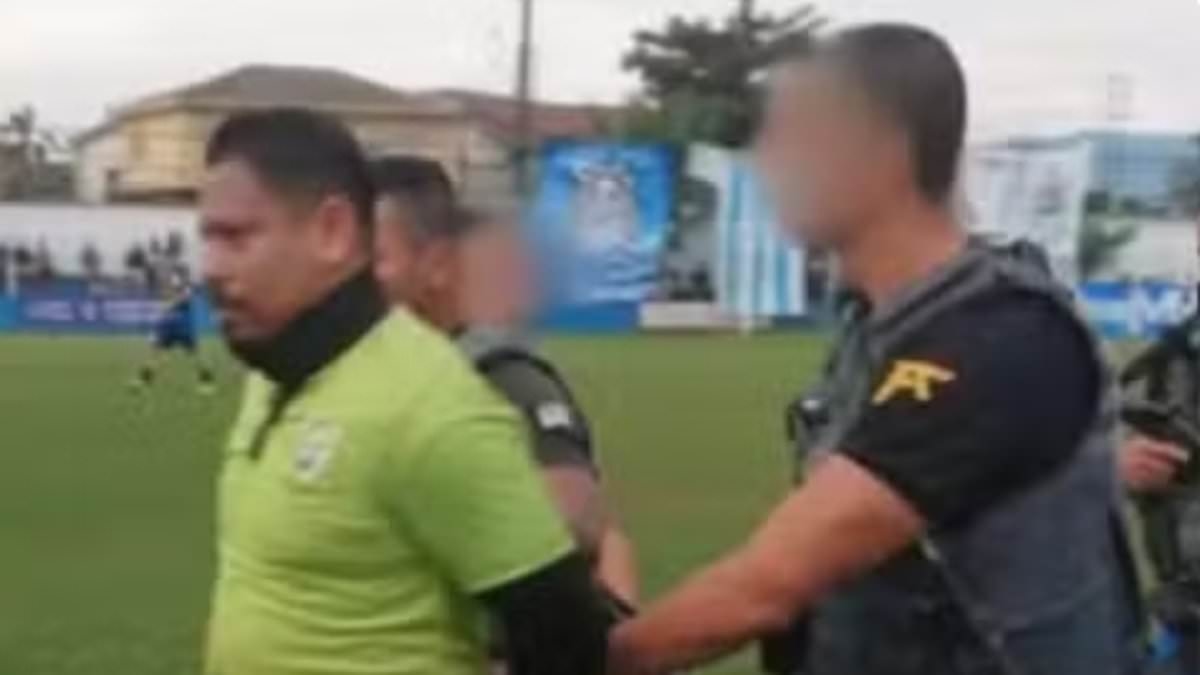 Soccer referee sensationally arrested DURING match and hauled off field in handcuffs