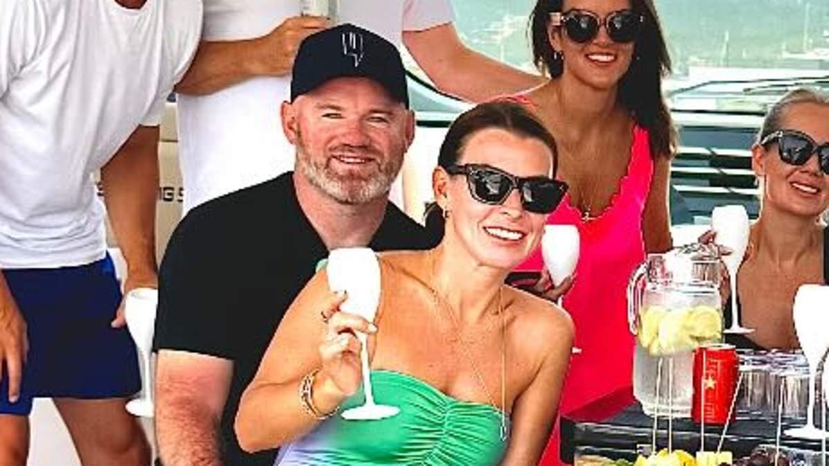 Coleen and Wayne Rooney look smitten in Ibiza as they join his former Manchester United teammate John O'Shea on a sun-soaked boat trip