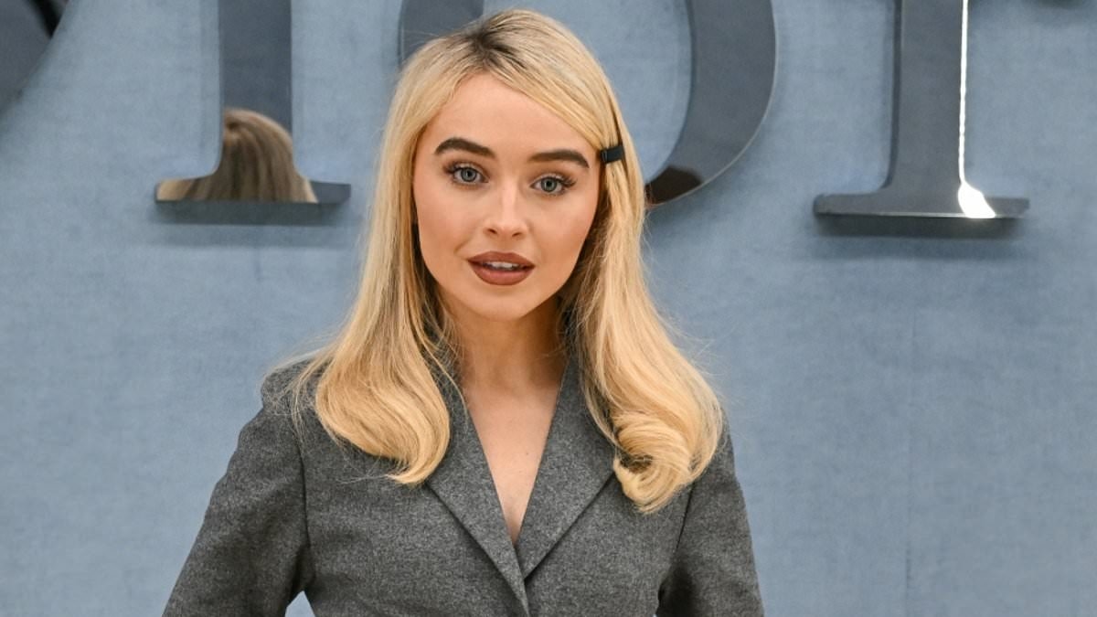Sabrina Carpenter looks uncharacteristically conservative in a chic in a grey pleated skirt suit as she leads the stars at the Dior Homme show amid Paris Fashion Week