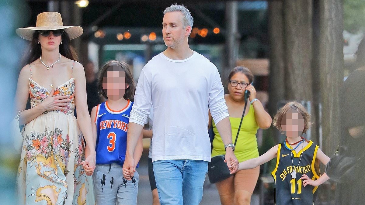 Anne Hathaway enjoys a VERY rare family day out in NYC with her husband and two sons
