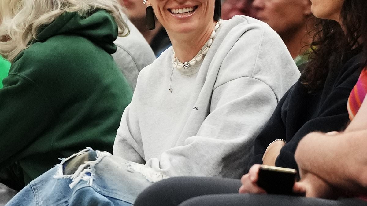 Megan Rapinoe wears Pride outfit to watch WNBA game with Sue Bird
