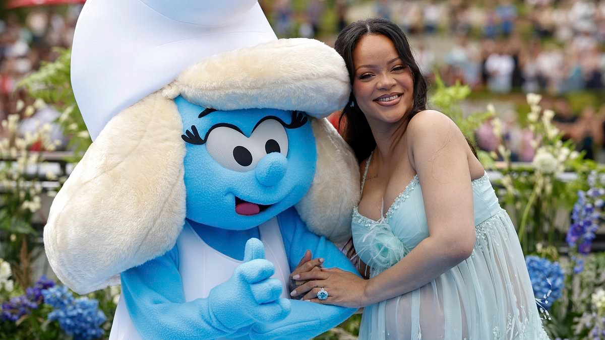 Pregnant Rihanna shows off her growing baby bump in a mesh gown as she attends global premiere of highly-anticipated Smurfs movie in Brussels