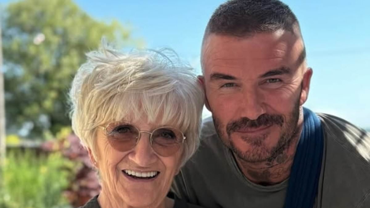 Injured David Beckham and son Romeo enjoy a colourful cake with his mum Sandra as they celebrate her 76th birthday - after estranged Brooklyn showed not all family ties had been severed amid ongoing feud