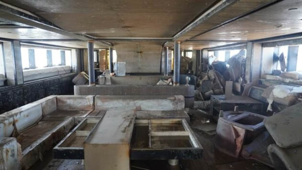 Inside the recovered Bayesian: Tragic superyacht's eerie interior revealed following its salvage recovery after it sank killing seven people