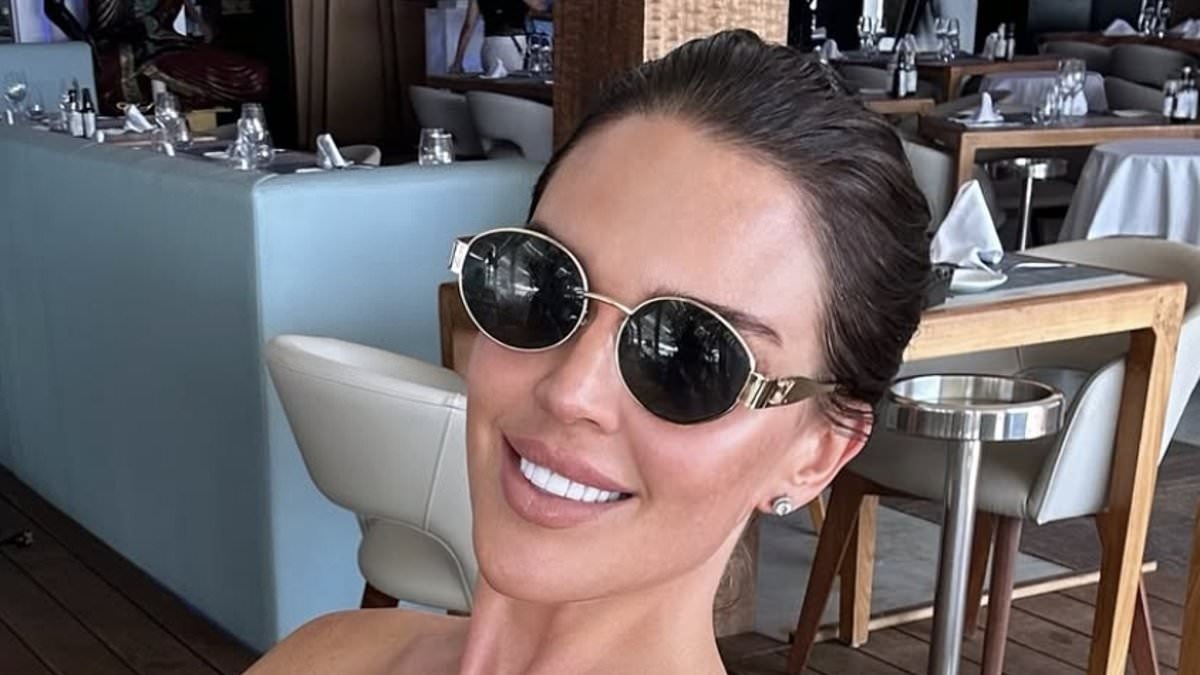 Danielle Lloyd shows off her washboard abs in a tiny yellow bikini after revealing she lost two stone following shock cancer diagnosis