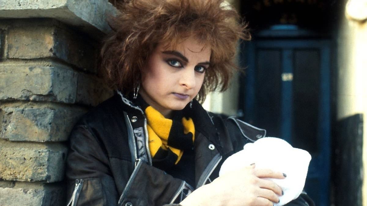 Iconic EastEnders star is unrecognisable four decades on from soap debut - ditching 'punk' style for VERY different look