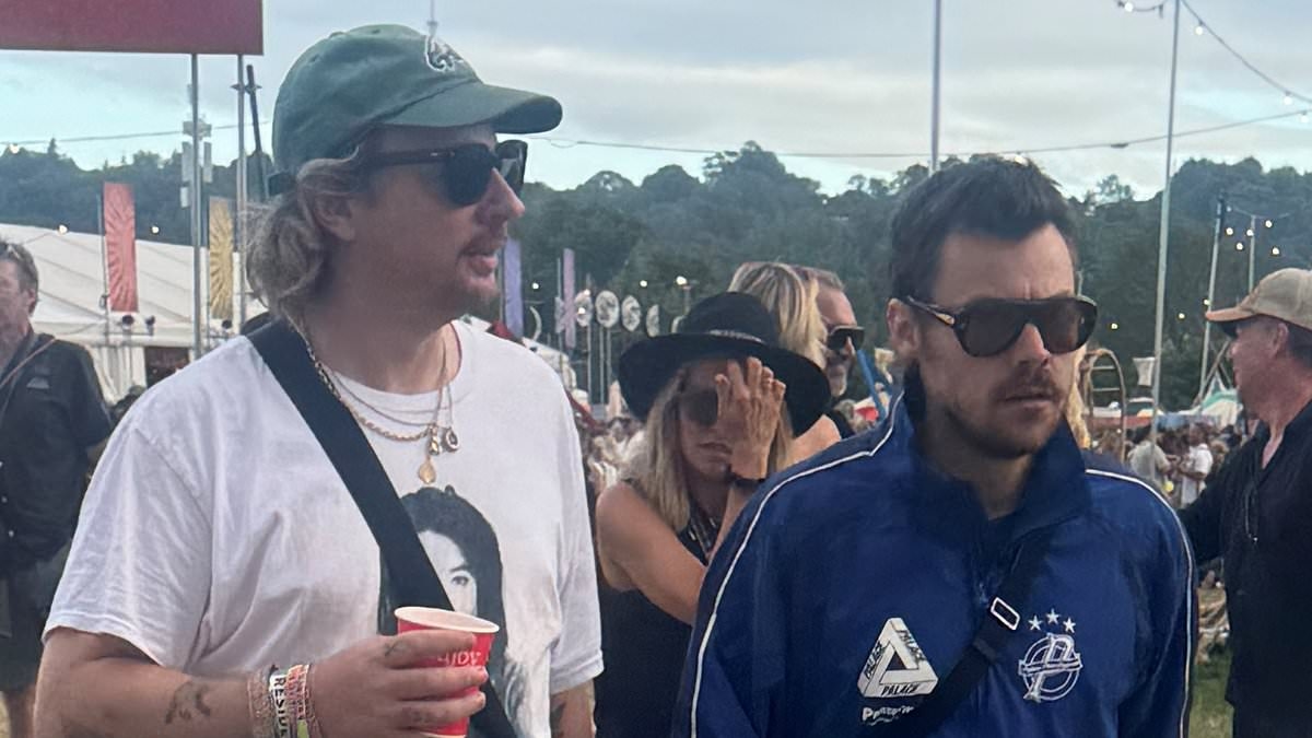 Harry Styles mingles with Glastonbury revellers shortly before his 'passionate kiss with a mystery woman' as new picture of One Direction star emerges