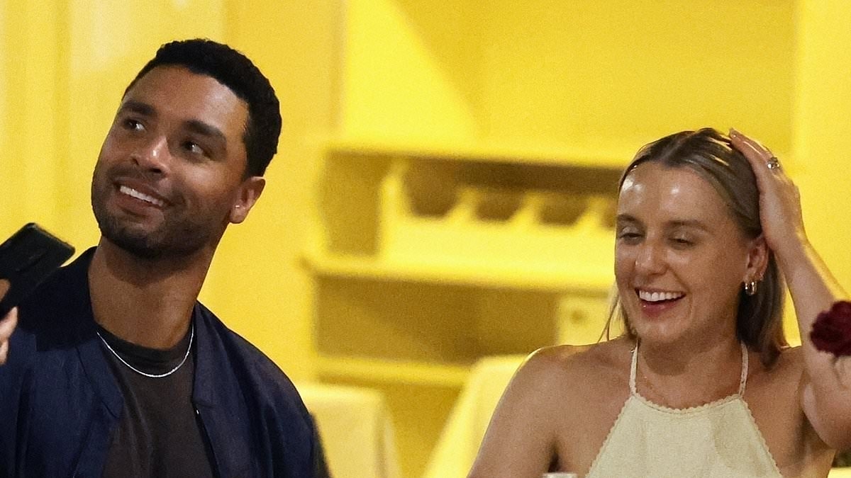 Regé-Jean Page makes a rare public appearance with girlfriend Emily Brown as the couple enjoy a romantic date at Rome's famous Pierluigi restaurant