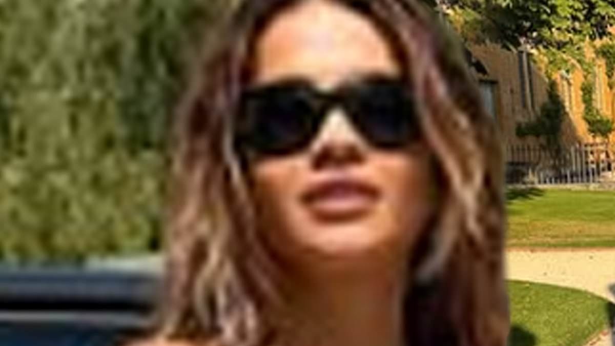 Rita Ora sends temperatures soaring in a skimpy £450 Burberry bikini as she poses for sizzling Glastonbury snaps