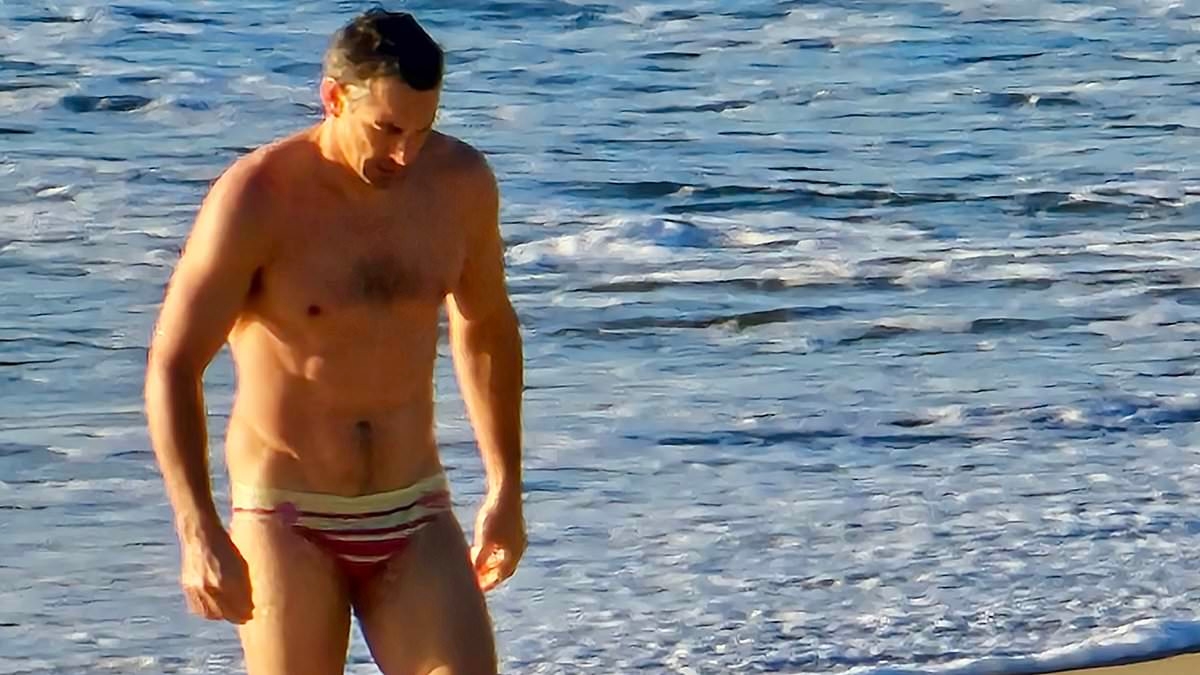 EXCLUSIVE Footy legend Billy Slater looks fit enough to play as he takes a freezing dip at Queensland's State of Origin camp