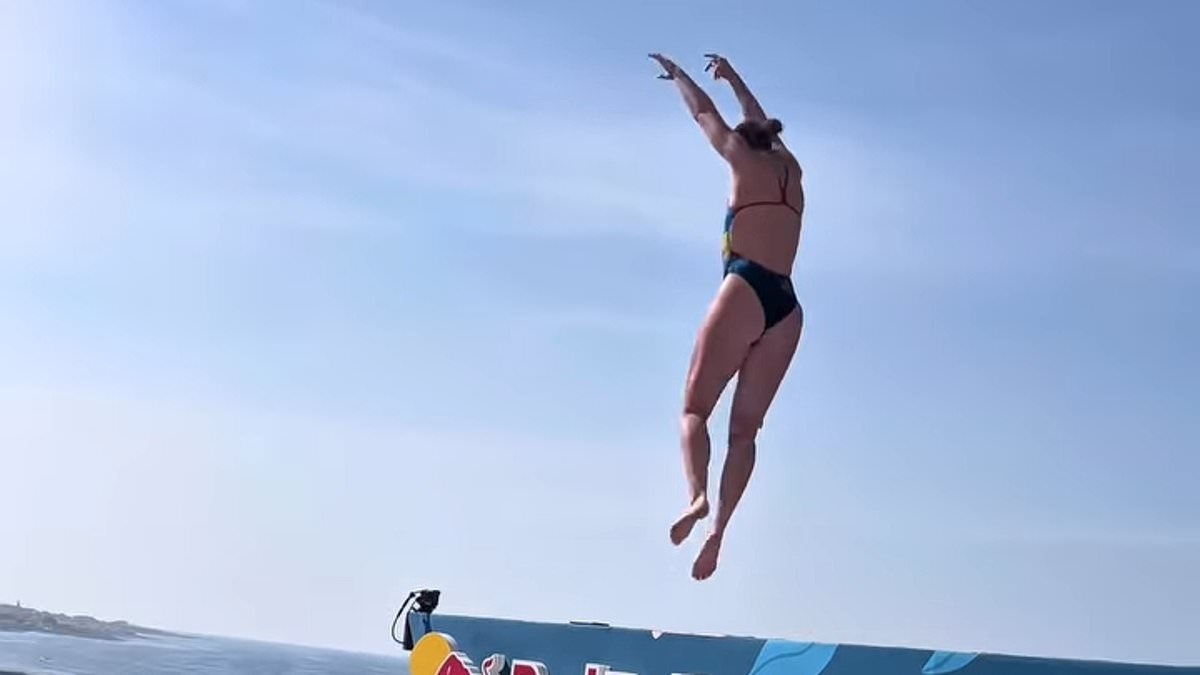 Professional cliff diver suffers NEAR DEATH experience as she slips off 72-foot high platform into water by jagged rocks
