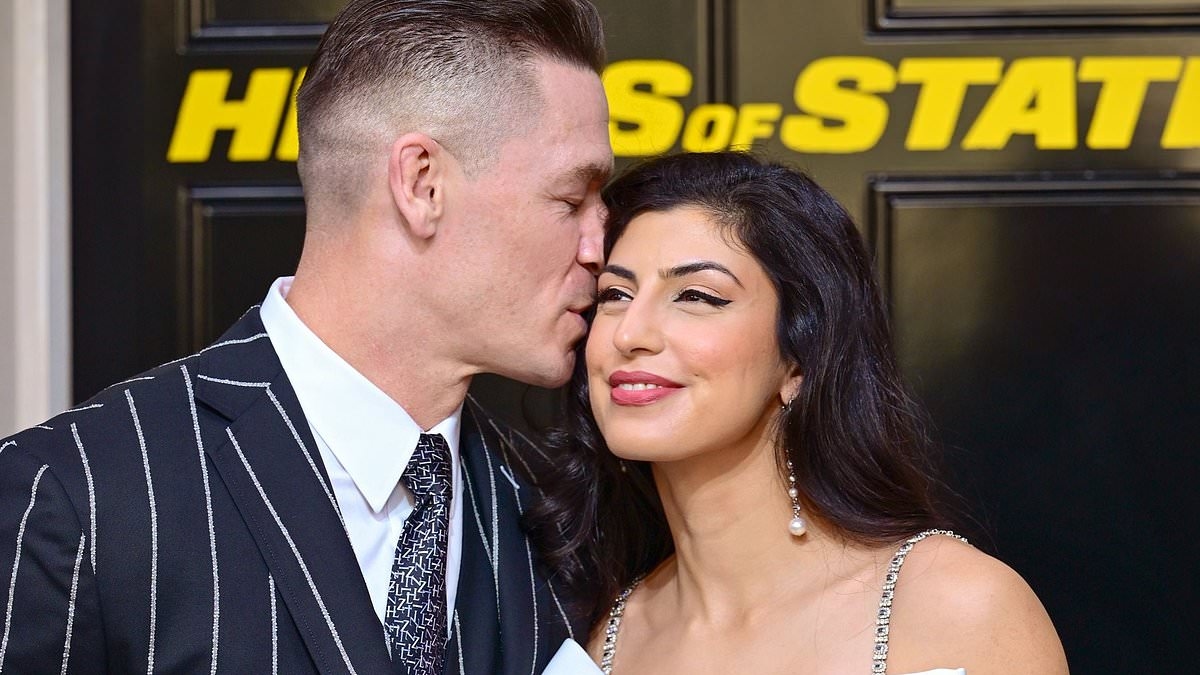 John Cena, 48, packs on the PDA with glamorous wife Shay Shariatzadeh, 36, as couple make a rare appearance at Heads of State screening in London