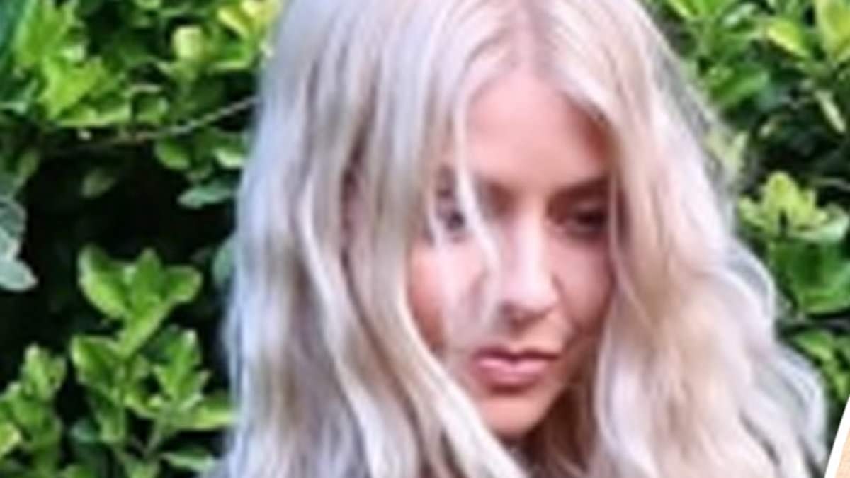 Holly Willoughby's gothic Glastonbury look is a sell-out with self-designed hiking boots and belted mini dress - as her festival fashion wows style-stealing fans