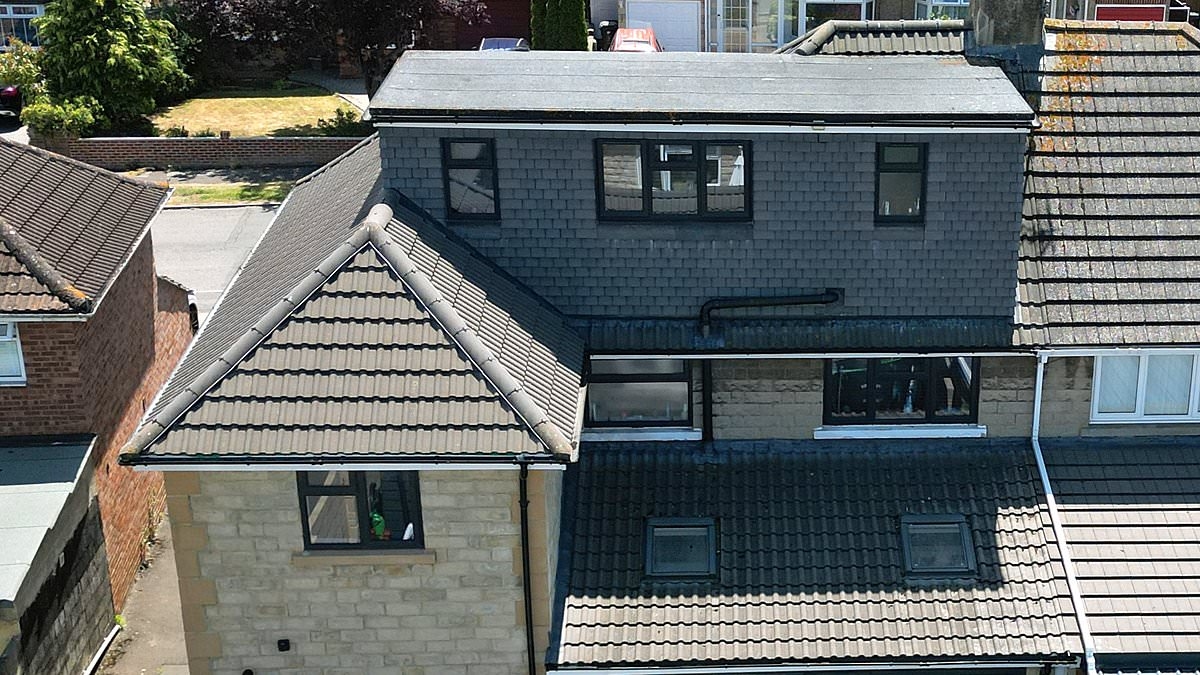 EXCLUSIVE Neighbours' fury as penny-pinching council rules homeowner's illegally built 'monstrosity' dormer is allowed to stay