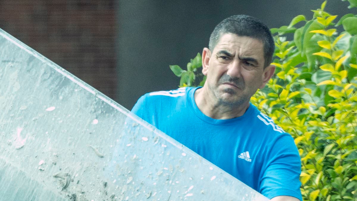 Albanian accused of two murders who got British citizenship under a false name will NOT be deported home because it 'would be flagrant denial of his human rights'
