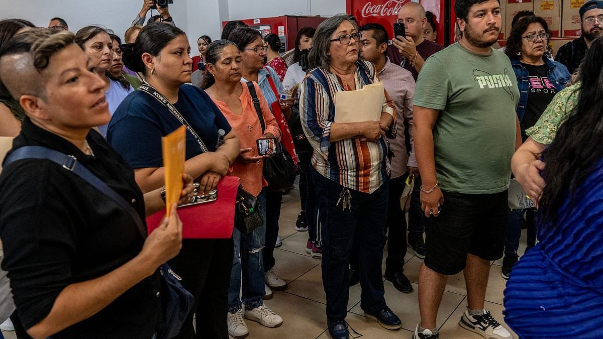 Outraged mob of grieving families demand answers after 400 corpses are found in house of horrors