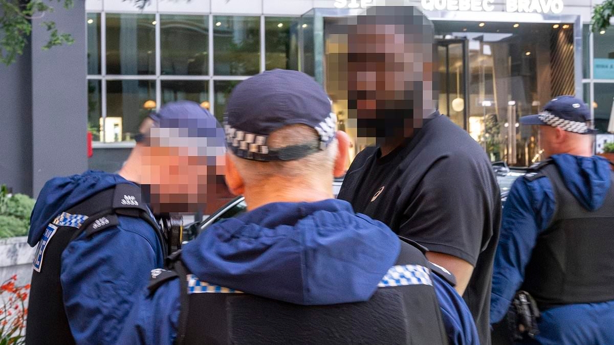 Moment police arrest county lines 'gang member' during dawn raid as they shut down 100 drugs networks in a week