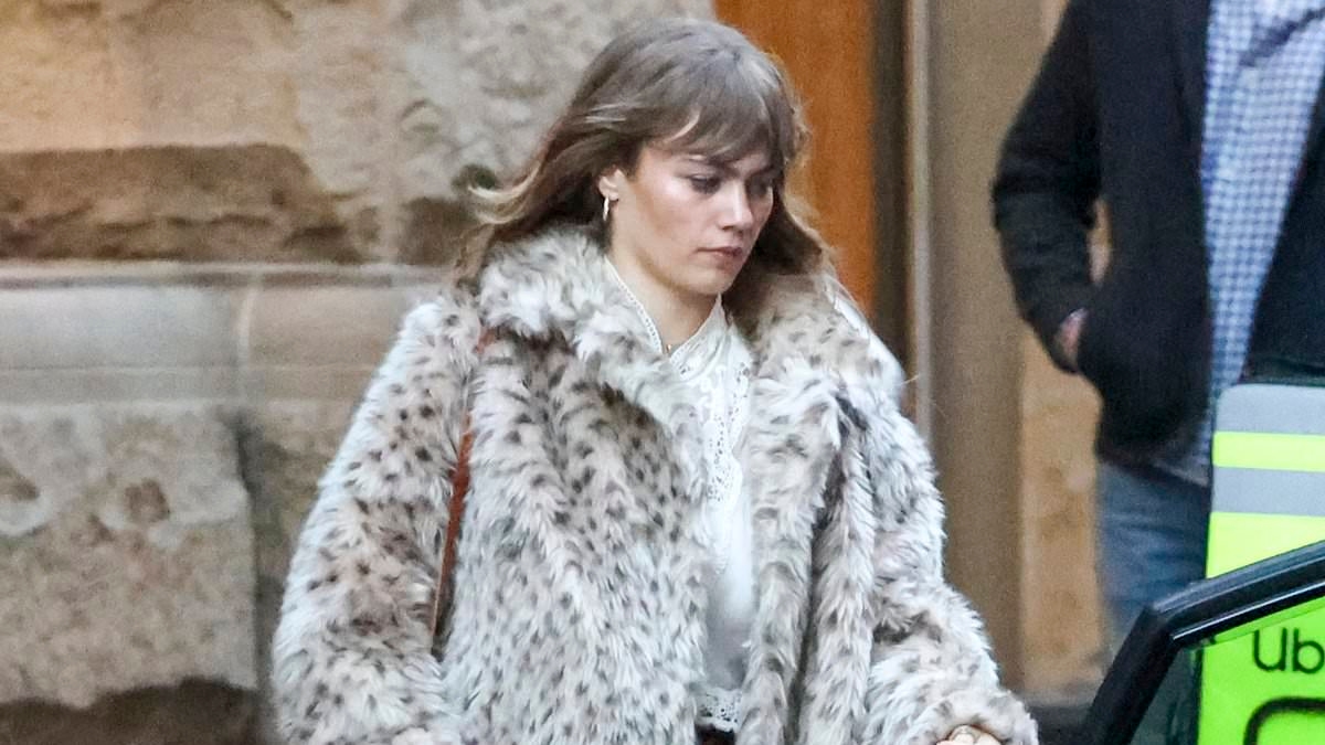 Lleyton and Bec Hewitt's daughter Mia looks every inch the rocker in a leopard print faux fur coat as she arrives for a gig in Sydney