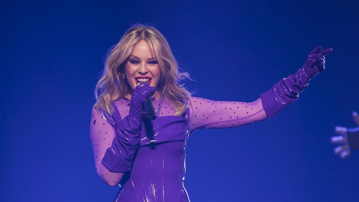Kylie Minogue looks sensational in skin-tight latex catsuit as she makes triumphant return to the stage in Berlin - weeks after being forced to cancel her show in the city due to illness