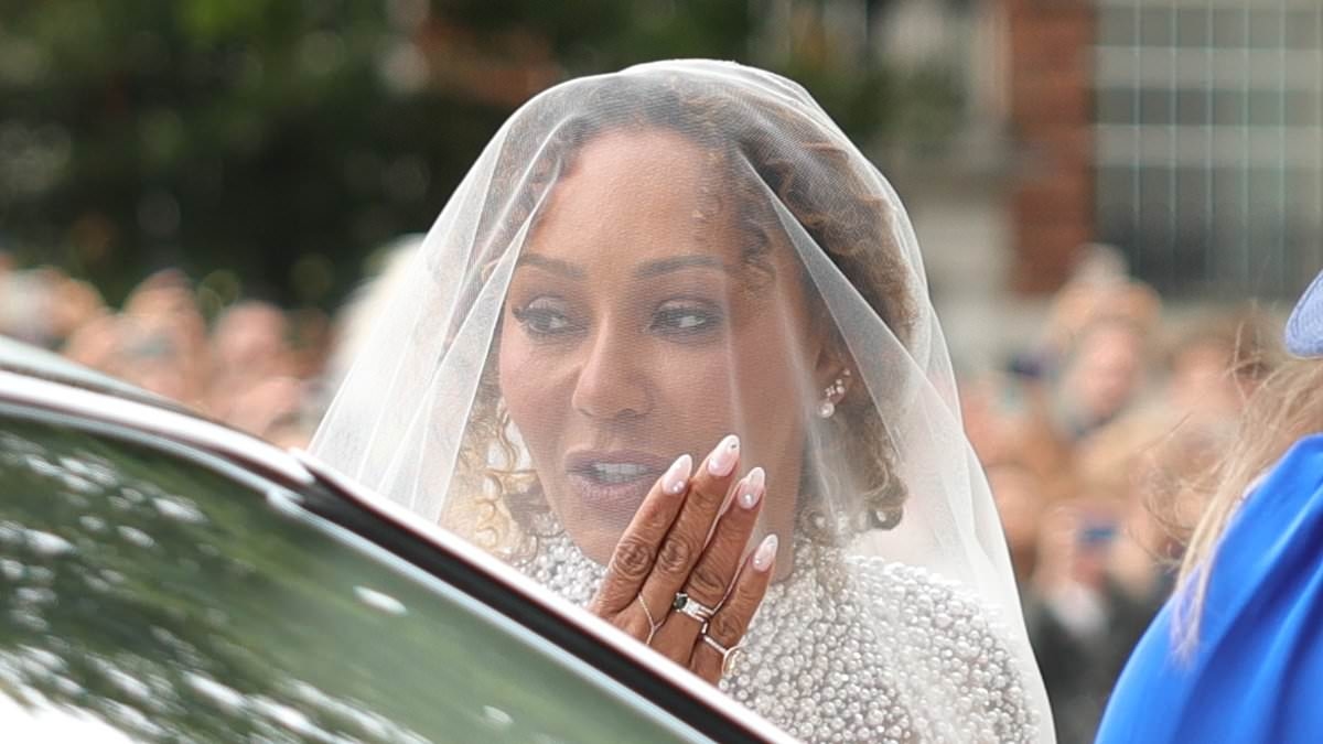 EXCLUSIVE Mel B's beloved Yorkshire Terrier Cookie serves as ringbearer during Spice Girl's wedding to Rory McPhee at St Paul's Cathedral