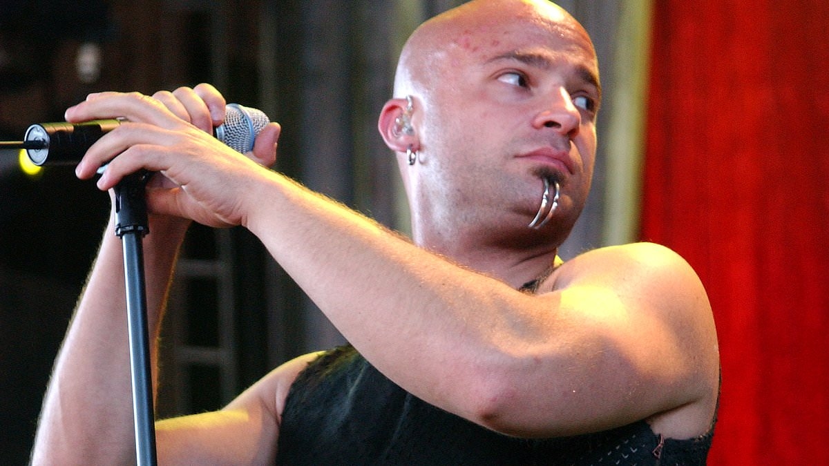 Disturbed's frontman David Draiman is BOOED as he plays support slot at Ozzy Osbourne's Back to the Beginning finale - amid rock singer's ongoing support for Israel in war on Hamas