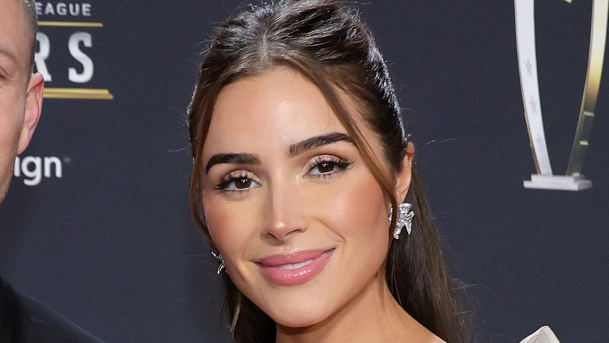 Olivia Culpo fans think she is pregnant with TWINS as she poses in a bikini with husband Christian McCaffrey