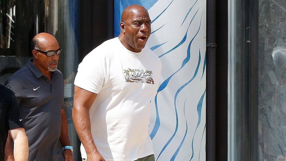 Basketball billionaire Magic Johnson's heartwarming act as he soaks up the sun on family vacation in Monaco