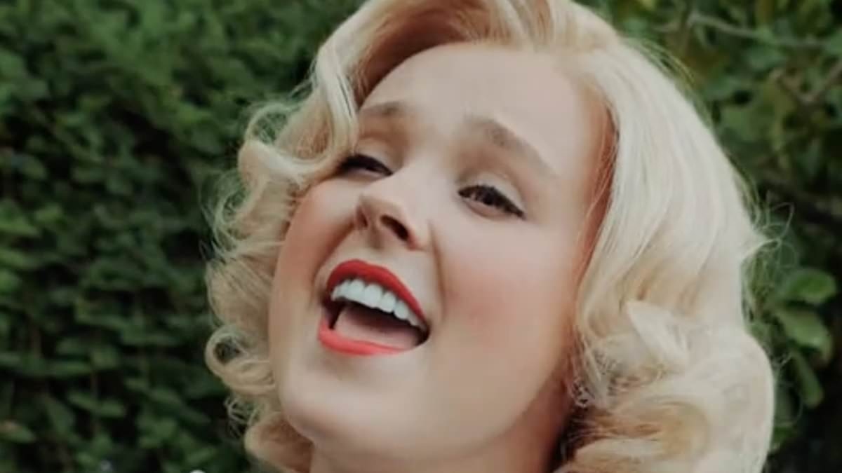 JoJo Siwa looks unrecognisable as she transforms into Hollywood icon Bette Davis in first glimpse at her new music video (and boyfriend Chris Hughes is quick to show his support!)